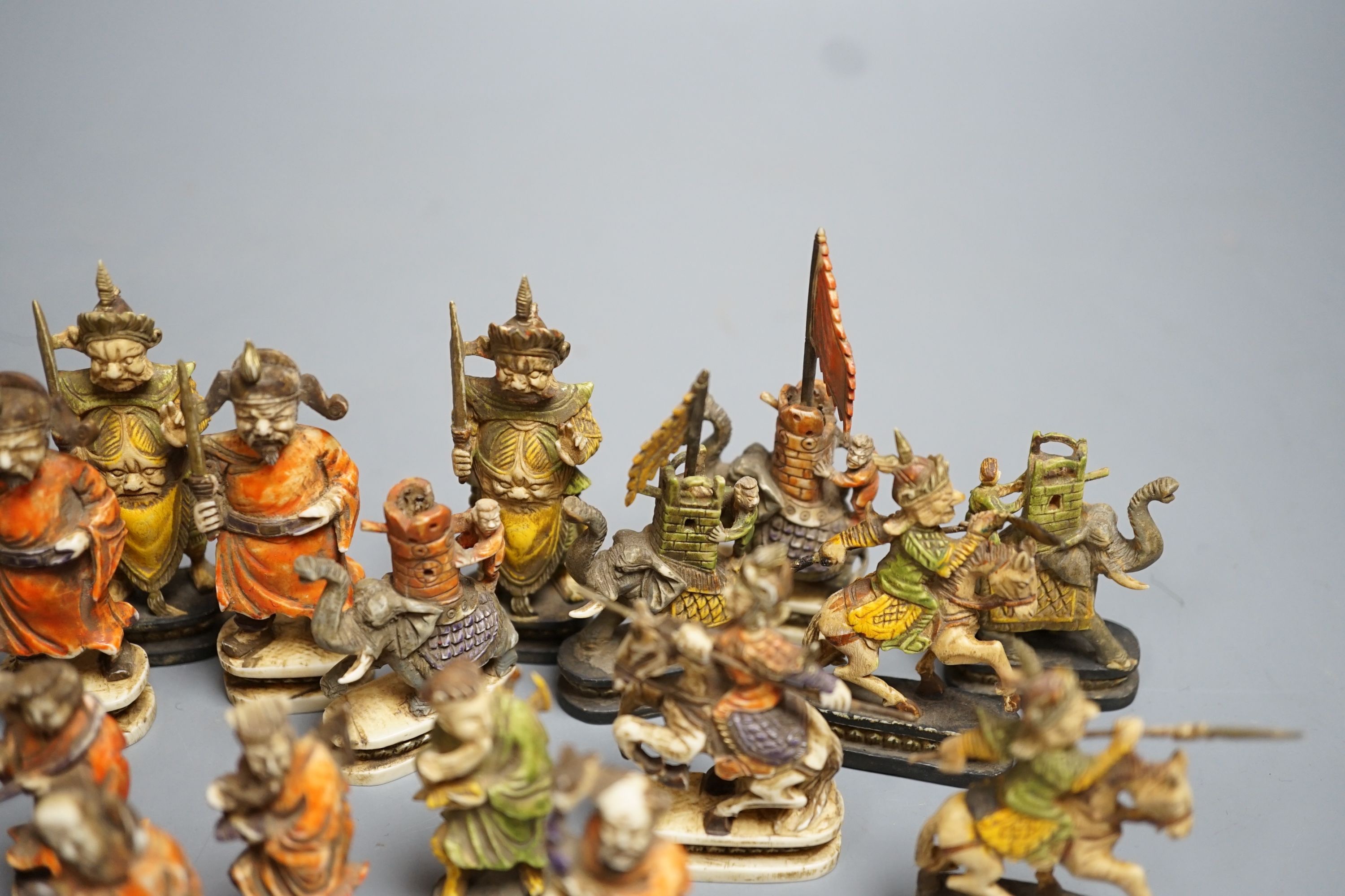 An early 20th century south East Asian stained ivory chess set